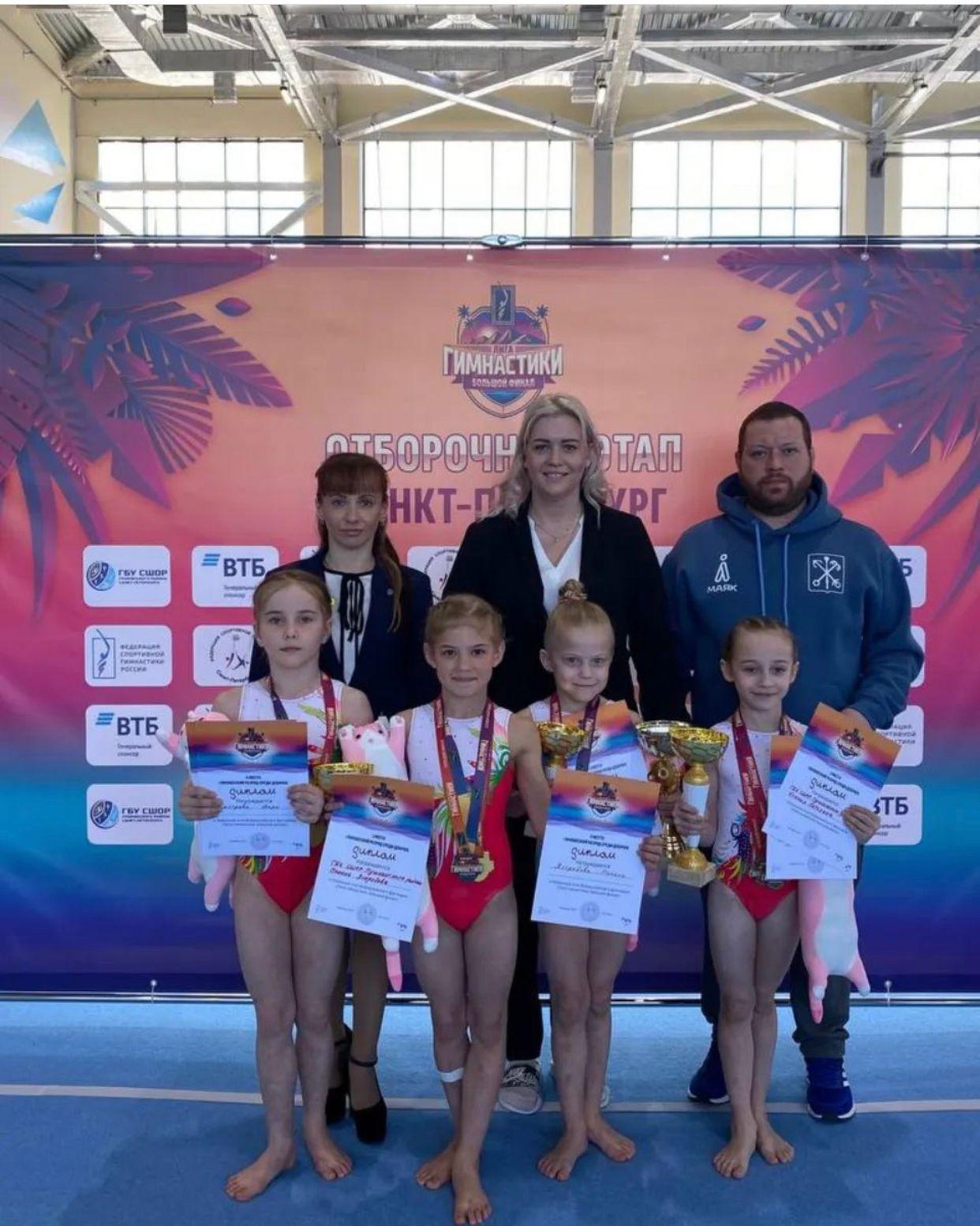 Купальник женский для спортивной гимнастики GK Sport GYM RU 107-62 белый с оранжевым со стразами без рукава